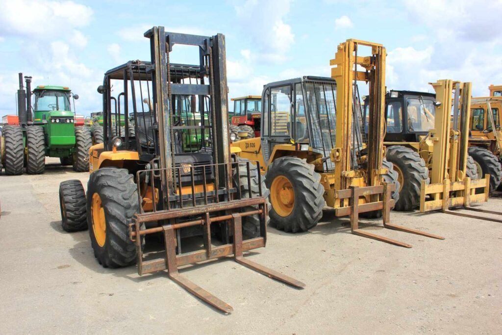 Array of industrial forklifts and tractors outdoor