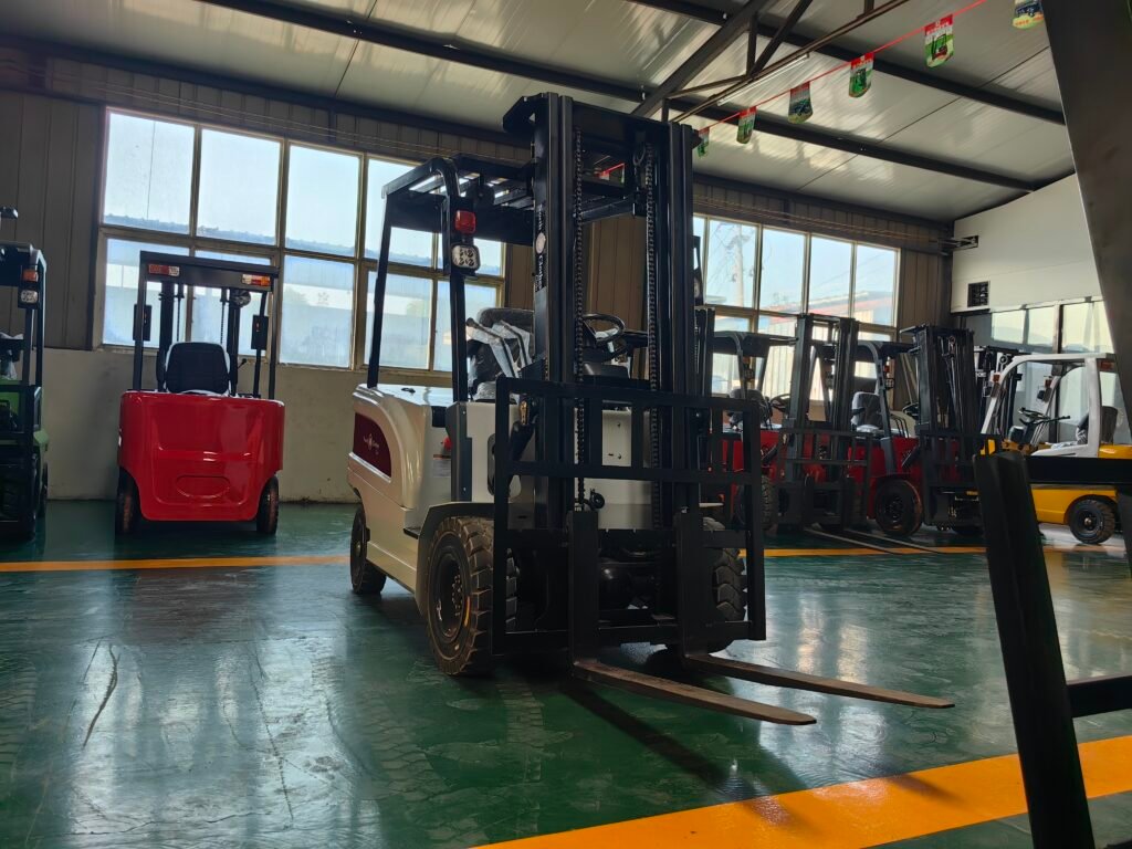 Various forklifts parked inside an industrial warehouse