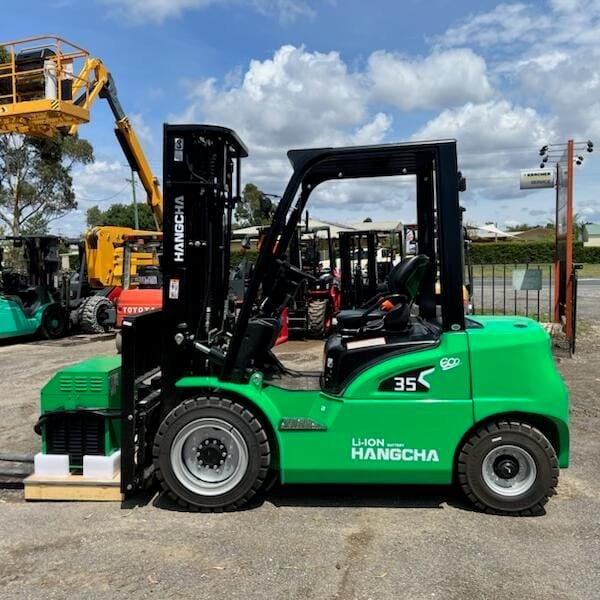 Green Hangcha forklift parked in industrial yard